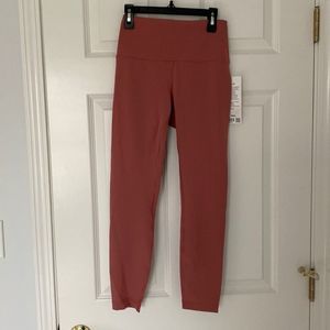 NWT. Wunder Train HR Tight 25”
